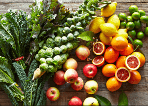 a group of fruits and vegetables on a wood surface Healthy Weight Loss Diets Dunmow